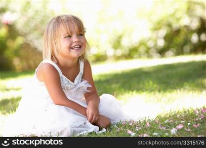 Young girl posing in park