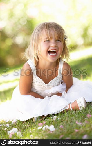 Young girl posing in park