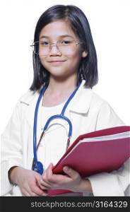 Young girl pretending to be a doctor