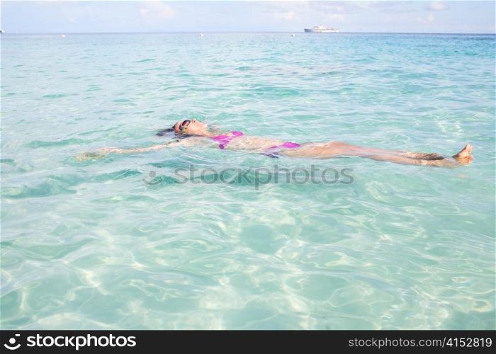 Young Girl Relaxing In Tropical Sea