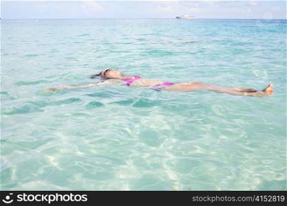 Young Girl Relaxing In Tropical Sea