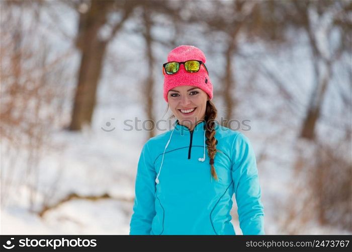 Young girl running in park. Winter exercises and fitness. Health nature fit concept. . Young girl running in park