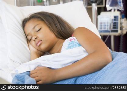 Young Girl Sleeping In Hospital Bed