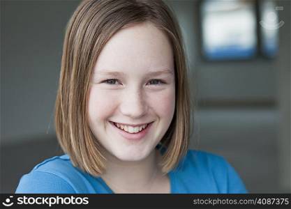 young girl smiling at viewer