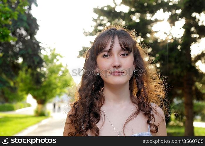 Young girl smiling, portrait in nature
