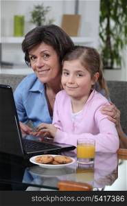 Young girl spending time with grandma