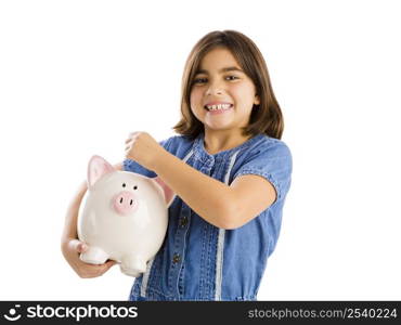 Young girl start her savings on a piggybank