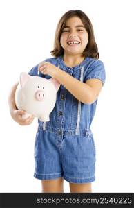 Young girl start her savings on a piggybank