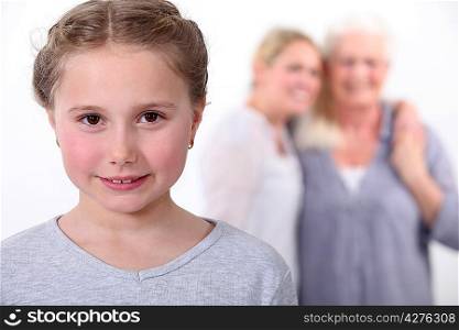 Young girl surrounded by female role models