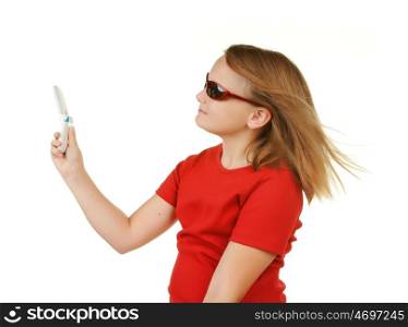 young girl taking her photo with mobile phone