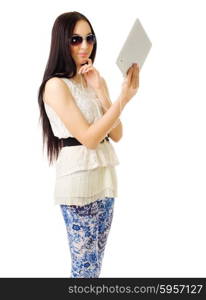 Young girl talks by tablet PC isolated