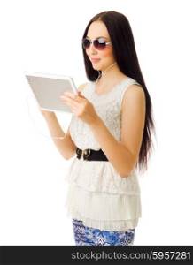 Young girl talks by tablet PC isolated