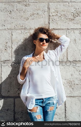 young girl walking on the old streets poland of europe