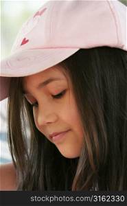 Young girl wearing a hat