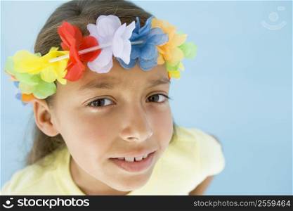 Young girl wearing garland on head