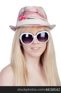 Young girl with a cap and sunglasses isolated on a over white background