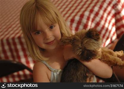 Young girl with a puppy.