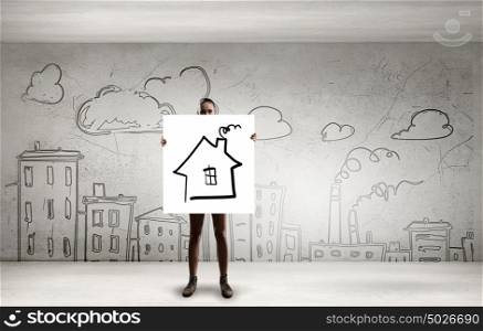 Young girl with banner. Young woman showing banner and urban sketches at background