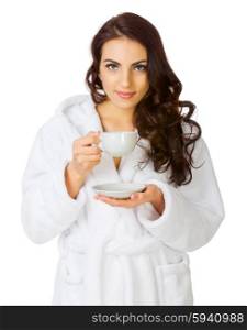 Young girl with bathrobe and cup isolated