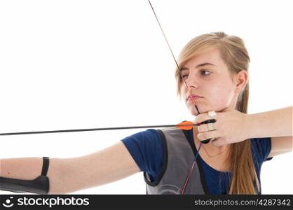 Young girl with blue shirt aiming with a longbow in closeup
