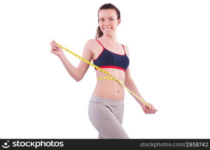 Young girl with centimeter in dieting concept