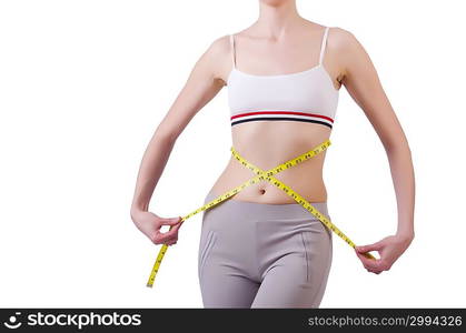 Young girl with centimeter in dieting concept