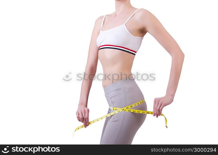 Young girl with centimeter in dieting concept