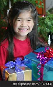 Young girl with christmas present