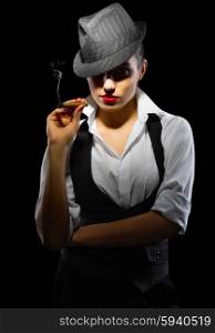 Young girl with cigar on black