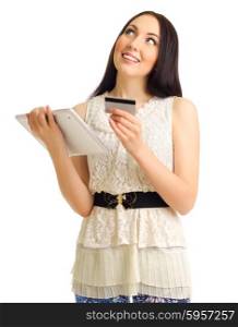Young girl with credit card and tablet PC isolated