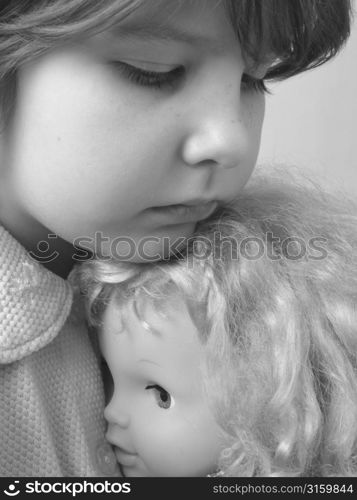 Young girl with doll