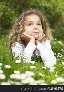 Young girl with flower in mouth