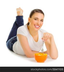 Young girl with fruit salad isolated