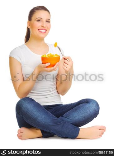 Young girl with fruit salad isolated