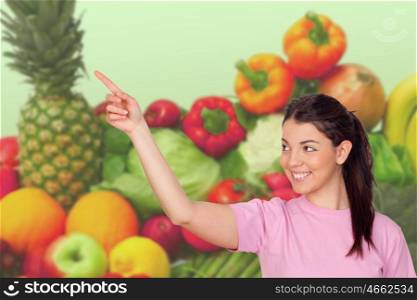Young girl with fruits and vegetables of background
