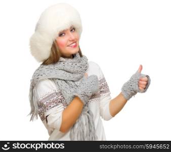 Young girl with fur hat showing ok gesture isolated