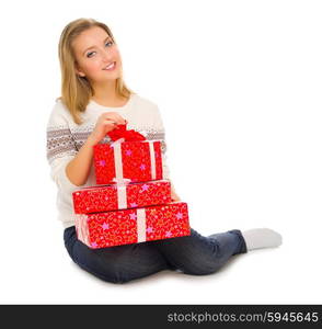 Young girl with gift boxes isolated