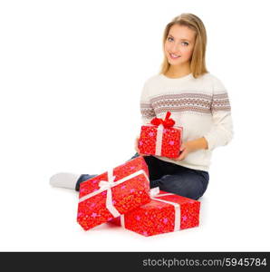 Young girl with gift boxes isolated