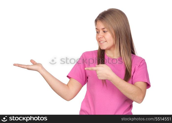 Young girl with her arm extended pointing something isolated on white background