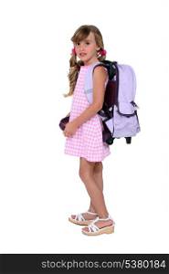 Young girl with her schoolbag