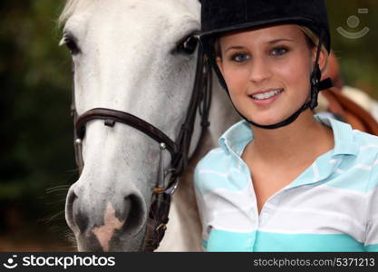 Young girl with horse