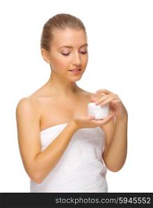 Young girl with jar with body cream isolated