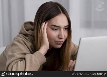 young girl with laptop