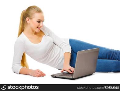 Young girl with laptop at floor isolated