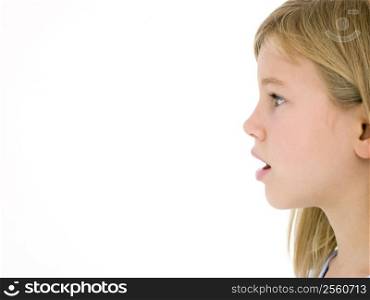 Young girl with mouth open