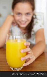 Young girl with orange juice