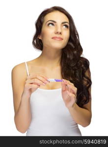 Young girl with pregnancy test isolated