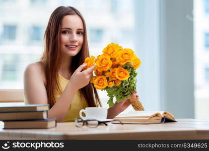 Young girl with present of flowers