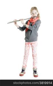 young girl with red hair and freckles with flute in studio against white background