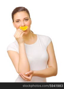 Young girl with slice of orange isolated